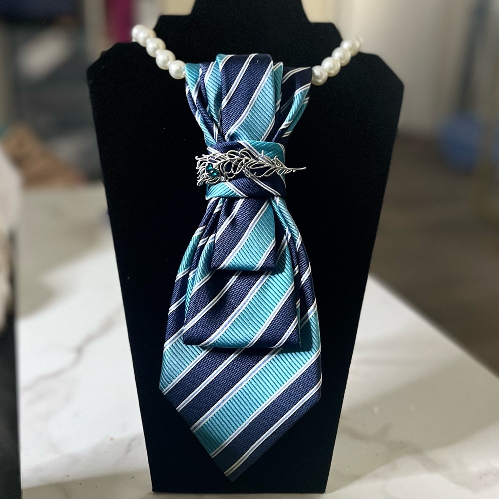 Striped Blue and White Necktie necklace with Silver brooch.